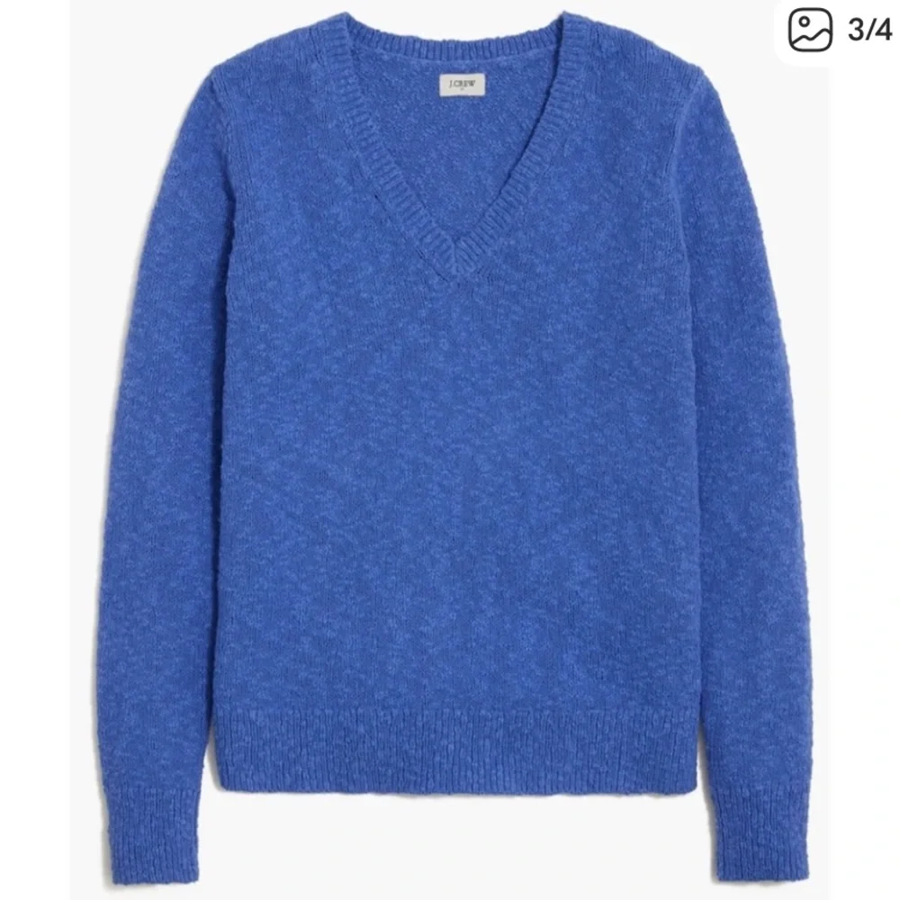 J.Crew V-neck slub sweater in blue. Women’s size large.